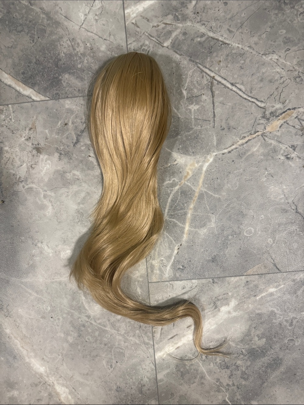 2/$40. 22” Synthetic Clip-In Ponytail Extension - Natural Light Blonde